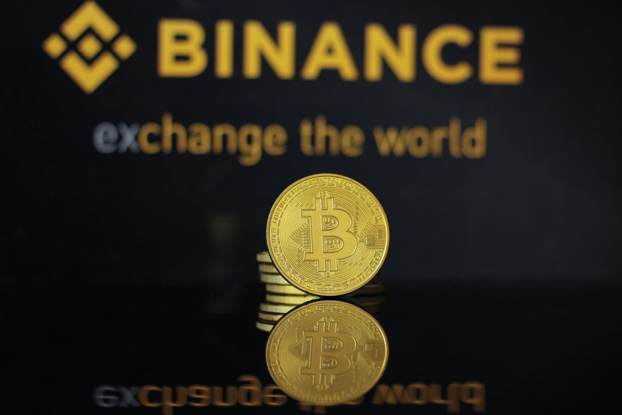bitcoins against Binance exchange background