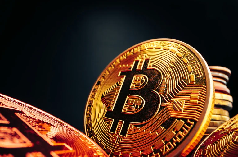 DOJ Charges Executive in $328M Crypto Scheme